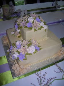 4 Spring Tan with Tan and Purple Flowers and Fondant Bows