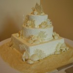 14 wedding white chocolate shells sand on table square bottom