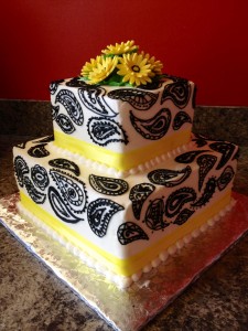 Black and White Paisley cake with yellow ribbon